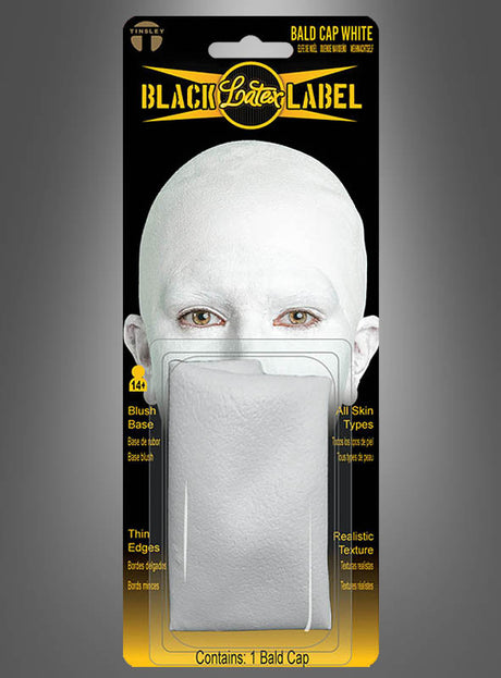 Eine verpackte Latex-Glatzenkappe „FX Film Glatze Tinsley Transfers“ wird vor einem grauen Hintergrund gezeigt; auf der Verpackung ist eine Person abgebildet, die die Kappe trägt. Der Text hebt die Eigenschaften des Produkts hervor, darunter die hochwertige „Black Label“-Latex-Verarbeitung, die für ein realistisches Erscheinungsbild sorgt.