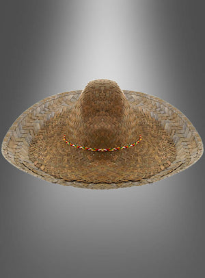 Der „Mexikaner Hut Sombrero Unisex“ besticht durch sein geflochtenes Strohdesign mit breiter Krempe und gemustertem Band, das sich vor einem grau verlaufenden Hintergrund abhebt – ideal, um Ihr Amigo-Kostüm abzurunden.