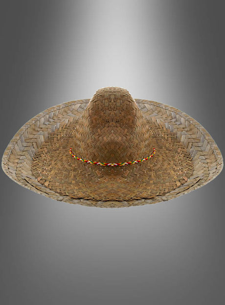 Der „Mexikaner Hut Sombrero Unisex“ besticht durch sein geflochtenes Strohdesign mit breiter Krempe und gemustertem Band, das sich vor einem grau verlaufenden Hintergrund abhebt – ideal, um Ihr Amigo-Kostüm abzurunden.