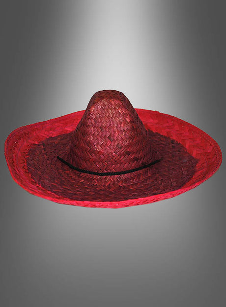 Ein leuchtend roter „Mexikaner Hut Sombrero Unisex“ mit breiter Krempe und spitzer Krone, der jedes Amigo-Kostüm perfekt abrundet, vor einem grauen Hintergrund mit Farbverlauf.
