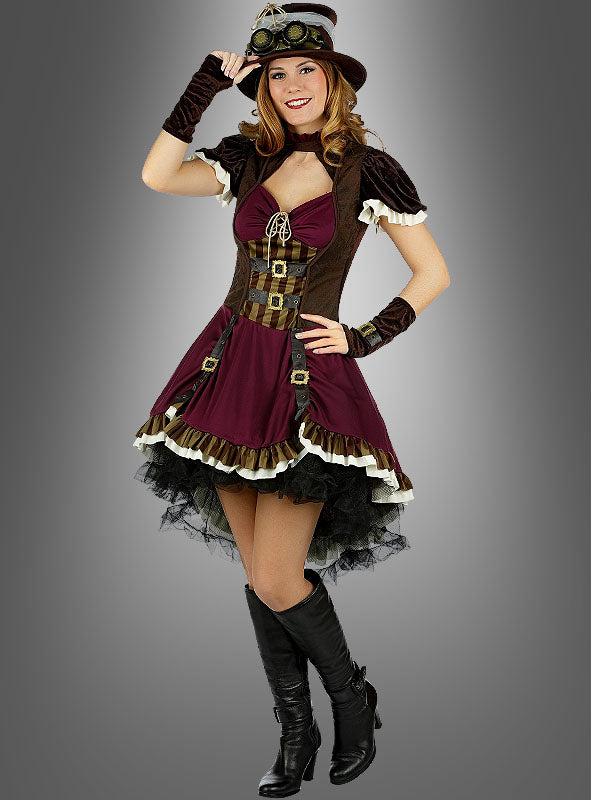 Eine Person, die ein Steampunk-Lady-Kostüm mit Hut trägt – ein von Steampunk inspiriertes Kostümkleid in Braun und Burgunderrot mit kariertem Oberteil, Rüschen, fingerlose Handschuhe und einem „Sexy Steampunk-Kostüm für Damen“-Flair, ergänzt durch das mitgelieferte Steampunk-Zylinder-Accessoire mit Schutzbrille und abgerundet durch schwarze kniehohe Stiefel.