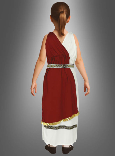 Ein Kind ist von hinten zu sehen, das das „Römische Schönheit“-Kinderkostüm trägt – ein weiß-rotes, togaähnliches Outfit mit einem gemusterten Gürtel – und vor einem grauen Hintergrund mit Farbverlauf steht.