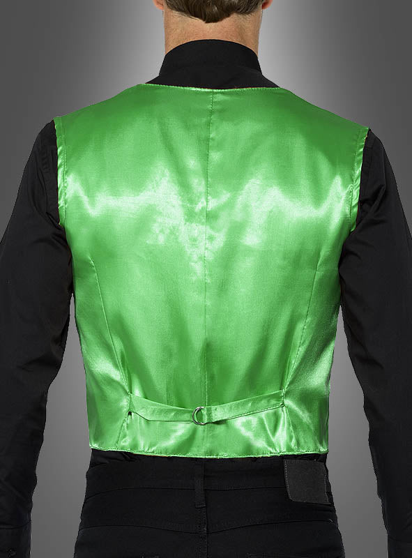 Eine Person ist von hinten zu sehen und trägt eine grüne Herrenweste mit Pailletten, wie sie typischerweise bei Karnevalskostümen verwendet wird, über einem schwarzen T-Shirt.