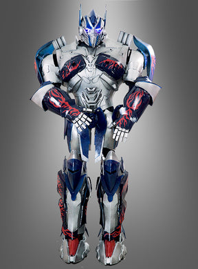 Ein Titanus Prime 270 cm Roboformer-Eventkostüm für den ganzen Körper, inspiriert von Optimus Prime aus „Transformers“, besticht durch eine auffällige Rüstung mit silbernen, blauen und roten Flammenmustern vor einem schlichten grauen Hintergrund – perfekt für jeden Anlass, bei dem ein beeindruckendes Roboterkostüm gefragt ist.