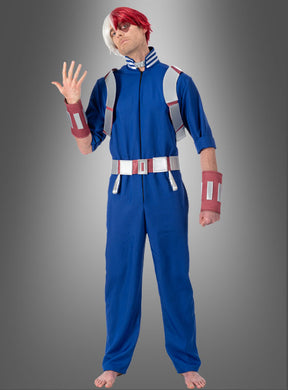 Eine Person posiert vor einem grauen Hintergrund und trägt das Shoto-Todoroki-Kostüm für Erwachsene aus „My Hero Academia“ – bestehend aus einem blauen Overall, rot-weißen Haaren und Armbändern. Dieses auffällige Anime-Kostüm gibt den ikonischen Look aus der beliebten Serie perfekt wieder.