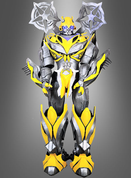 Das „Bumbleblade Roboter 270 cm Roboformer“-Eventkostüm im humanoiden Roboterdesign in Gelb, Schwarz und Silber mit beeindruckenden, Shuriken-ähnlichen Details an den Schultern hebt sich deutlich vom grauen Hintergrund ab – und ist damit die ultimative, auffällige Wahl für jede Veranstaltung oder für die Verwandlung in einen Mega-Transform-Bot.
