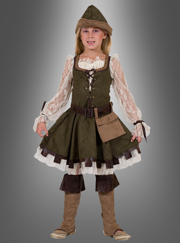 Ein junges Mädchen präsentiert das Robin-Hood-Kostüm für Mädchen, bestehend aus einem grünen Kleid im mittelalterlichen Stil mit Spitzenärmeln, einem braunen Gürtel, einer Tasche, einem passenden Hut und Stiefelüberzügen. Sie steht vor einem schlichten grauen Hintergrund – ideal als Mittelalterkleid für Kinder zum fantasievollen Spielen und für Themenveranstaltungen.