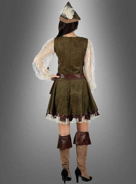 Eine Frau, die das Robin-Hood-Kostüm für Damen trägt – bestehend aus einem grün-braunen Kleid mit Spitzenärmeln, einem passenden Federhut und hohen braunen Stiefeln –, ist von hinten vor einem grauen Hintergrund mit Farbverlauf zu sehen.