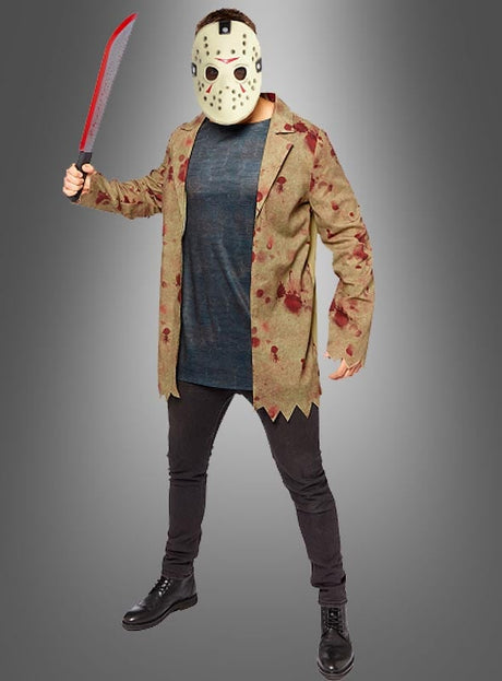 Eine Person mit einer Eishockeymaske, einer blutverschmierten Machete in der Hand und gekleidet in eine zerfetzte, blutbefleckte Jacke sowie eine schwarze Hose steht vor einem grauen Hintergrund – dieses „Jason Freitag, der 13.“-Kostüm für Herren ist die perfekte Wahl für jeden Anlass, bei dem ein Horrorfilm-Kostüm gefragt ist.