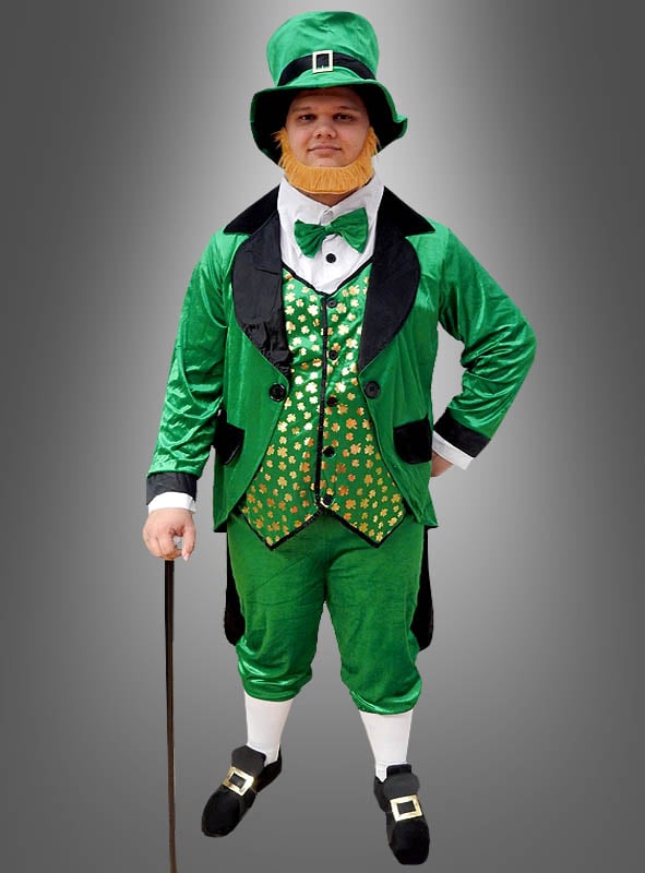 Eine Person, die das „Irischer Kobold Kostüm Leprechaun grün“ trägt – bestehend aus einem grünen Outfit mit Zylinder, Fliege und Spazierstock –, steht vor einem grauen Hintergrund mit Farbverlauf – perfekt, um den St. Patrick’s Day zu feiern.