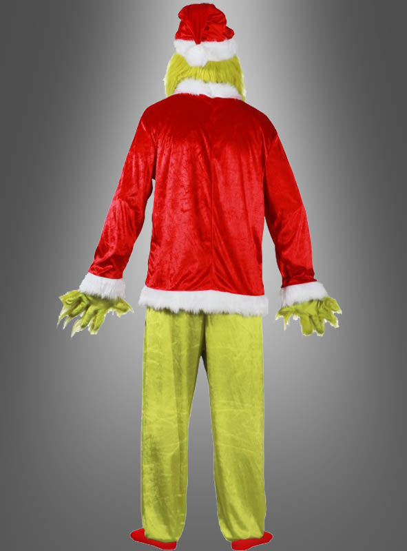 Eine Person, die das 5-teilige „Der Grinch“-Kostüm trägt – bestehend aus einem grünen Pelzanzug und einem roten Weihnachtsmann-Outfit –, steht mit dem Rücken zur Kamera vor einem grauen Hintergrund mit Farbverlauf.