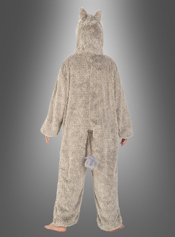 Eine Person, die das Wildschwein-Overall-Kinderkostüm „Asterix & Obelix“ trägt – ein pelziges, graues Tierkostüm mit Kapuze und Schwanz –, steht barfuß mit dem Rücken zur Kamera vor einem grauen Hintergrund mit Farbverlauf; ideal für fantasievolles Verkleiden oder ausgelassene Karnevalsfeiern.
