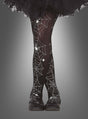 Spinnennetz-Strumpfhose für Kinder in Schwarz mit weißen Spinnennetz- und Spinnenmotiven, ideal als Halloween-Strumpfhose, kombiniert mit schwarzen Schuhen und einem schwarzen Rüschenrock vor einem grauen Farbverlaufshintergrund.
