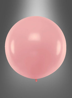Ein einzelner rosa XXL-Ballon der Marke „Runde Riesen“ (60–100 cm) schwebt vor einem grauen Hintergrund mit Farbverlauf.