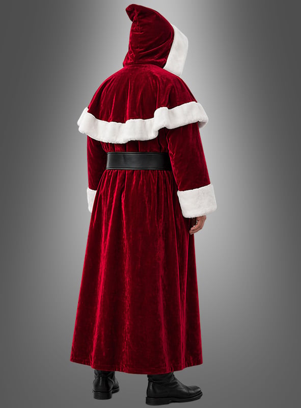 Eine Person ist von hinten vor einem grauen Farbverlaufshintergrund zu sehen. Sie trägt den „Mantel Weihnachtsmann dunkelrot“ – einen roten Samtmantel im Weihnachtsmann-Stil mit weißer Borte, schwarzem Gürtel und schwarzen Stiefeln.