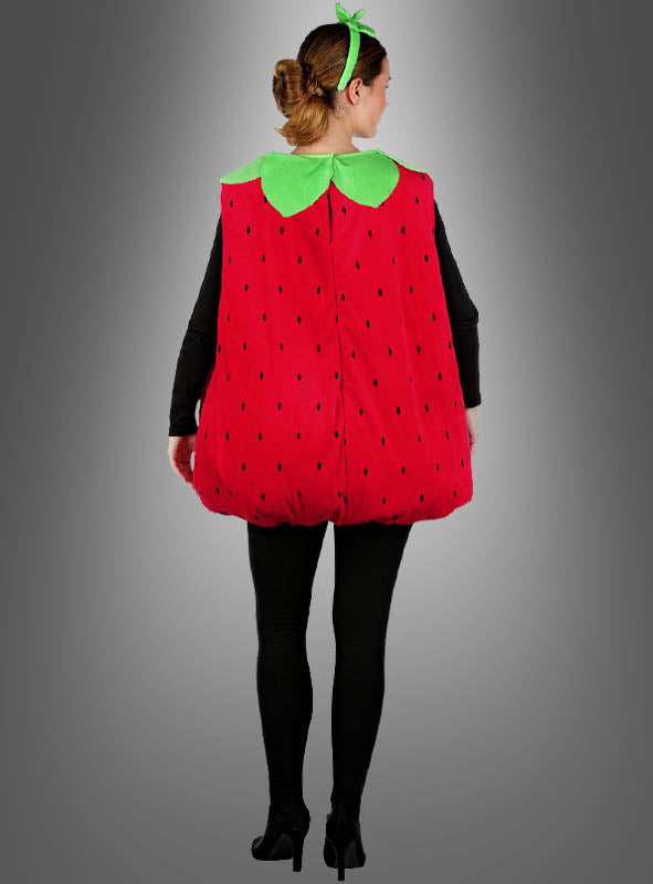 Eine Person, die das Erdbeere-Kostüm aus Plüsch für Erwachsene trägt – mit einem grünen Blattkragen und einem passenden Stirnband –, steht mit dem Rücken zur Kamera vor einem grauen Hintergrund mit Farbverlauf.
