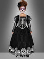 Ein Mädchen, das das „2. Wahl Deluxe Totenkopf-Kleid für Mädchen“ mit Skelett-Details trägt und dessen Gesicht mit Totenkopf-Make-up bemalt ist, steht vor einem grauen Hintergrund, auf dem unten der Schriftzug „2. Wahl“ zu sehen ist.