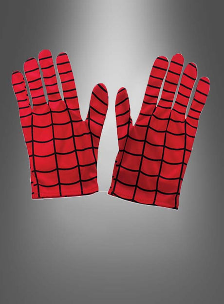 Ein Paar Spiderman-Handschuhe für Kinder in leuchtendem Rot, verziert mit schwarzen, netzartigen Linien, die vom legendären Marvel-Superhelden inspiriert sind, wird vor einem grauen Hintergrund mit Farbverlauf präsentiert – perfekt für jedes Kind, das von heldenhaften Abenteuern träumt.