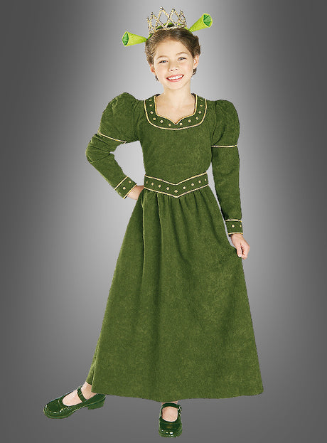 Ein Kind trägt das Prinzessin-Fiona-SHREK-Kinderkostüm, bestehend aus einem grünen Kleid im mittelalterlichen Stil mit Puffärmeln, passenden grünen Schuhen und einem Stirnband mit Oger-Ohren – perfekt für jeden kleinen Fan, der auf der Suche nach einem zauberhaften Kinderkostüm oder Ogerkostüm ist.