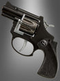 Ein schwarzer R8-Revolver für Agenten mit strukturiertem Griff, Metallabzug und sichtbarem Zylinder wird vor einem grauen Hintergrund mit Farbverlauf präsentiert – diese Spielzeugpistole ist im Stil einer 8-Schuss-Pistole gestaltet und eignet sich perfekt für fantasievolles Spielen oder als krönender Abschluss eines Agenten-Kostüms.
