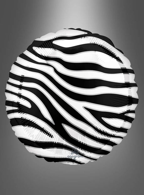 Der Zebra-Folienballon „Orbz“ (Kugel oder Scheibe) besticht durch ein auffälliges schwarz-weißes Zebrastreifenmuster und wird vor grauem Hintergrund abgebildet, was ihn zu einer markanten Wahl für jede Partydekoration macht.