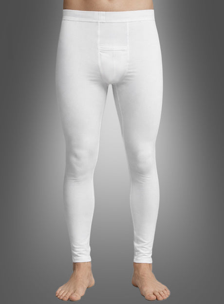 Eine Person, die Strumpfhosen oder Leggings für Männer trägt, steht barfuß vor einem neutralen grauen Hintergrund.