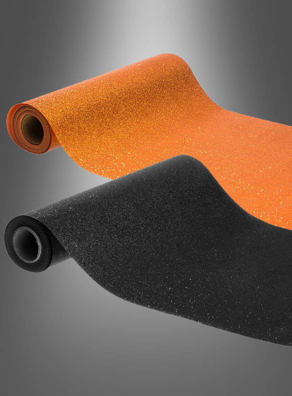 Zwei Rollen „Tischläufer mit Glitzer“ (30 x 500 cm), eine in Orange und die andere in Schwarz, sind auf einem grau verlaufenden Hintergrund abgebildet, wobei ihre Enden locker ausgebreitet sind – perfekt, um Ihrer nächsten Partydeko oder festlichen Tischdekoration einen Hauch von Glanz zu verleihen.