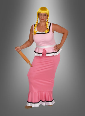Eine Person, die das „Gutemine“-Kostüm für Damen von Asterix trägt – ein langes rosa Kleid und eine gelbe Zopfperücke –, die einen Nudelholz in der Hand hält und vor einem schlichten grauen Hintergrund steht, bildet das perfekte Karnevalsoutfit.
