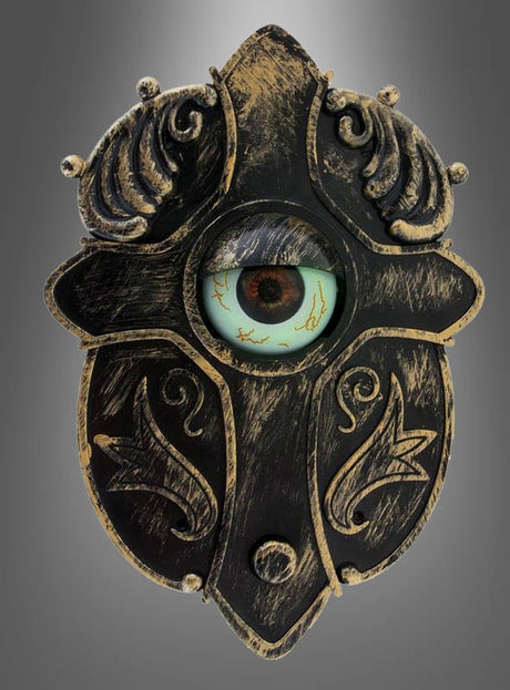 Verleihen Sie Ihrem Eingangsbereich mit der animierten Halloween-Türklingel einen ganz besonderen Touch – einer auffälligen, kunstvoll gestalteten Metallklingel mit Akzenten in Antikgold und einem lebensechten Augapfel in der Mitte, der von dekorativen Mustern umgeben ist. Vor einem grauen Hintergrund mit Farbverlauf ist dieses einzigartige Stück die ideale Halloween-Dekoration und wird Ihre Gäste garantiert begeistern und erschrecken.