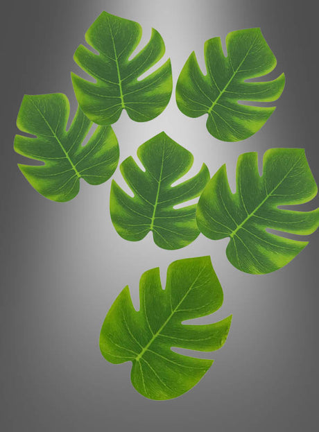 Sechs Palmenblätter als Tischdekoration für eine Hawaii-Party (15–44 cm), ideal als Dschungel-Party-Dekoration, sind auf einem grauen Hintergrund mit Farbverlauf angeordnet, wobei fünf davon oben gruppiert sind und eines unterhalb der Gruppe positioniert ist.