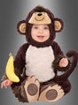 Ein Baby in einem braunen „Freches Äffchen“-Babykostüm mit Rassel, Kapuze und einer Plüschbanane in der Hand, das vor einem grauen Hintergrund mit Farbverlauf sitzt – perfekt für Kinderfasching-Feiern.