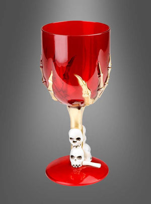 Wir präsentieren das Halloween-Weinglas mit Skeletthand (17 cm): ein leuchtend rotes Weinglas mit einem atemberaubenden goldenen Skeletthand-Motiv auf dem Kelch, ergänzt durch zarte weiße Totenkopf-Akzente entlang des Stiels. Vor einem grau verlaufenden Hintergrund setzt dieses einzigartige Stück ein unvergessliches Highlight für Ihre Halloween-Dekoration.