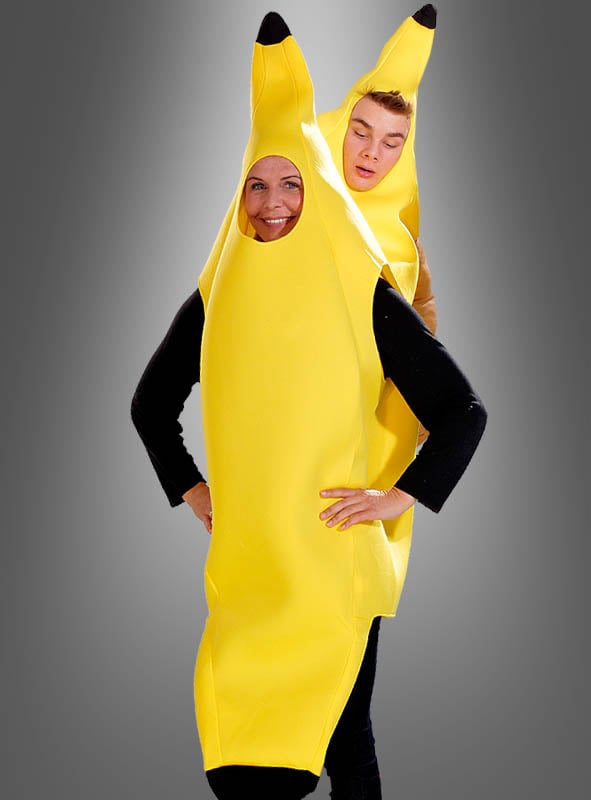 Mit dem Bananenkostüm Unisex lassen sich zwei Personen zu einem lustigen Gruppenkostüm zusammenfügen: Eine Person steht vorne, während die andere hinten steht, wobei ihre Köpfe spielerisch durch freche Ausschnitte hervorschauen – das Ganze vor einem stilvollen grauen Hintergrund mit Farbverlauf.