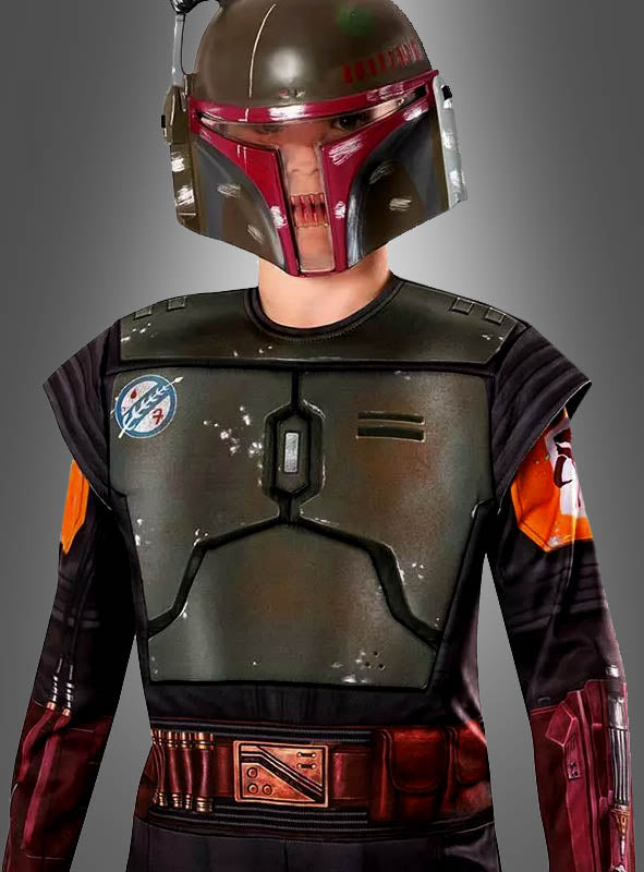 Ein Kind in einem Boba-Fett-Kostüm für Kinder aus „Star Wars“, komplett mit Helm und detailreicher Rüstung, steht vor einem schlichten grauen Hintergrund – ideal für jeden jungen Fan, der gerne in die Rolle seines Lieblings-Mandalorianers schlüpfen möchte.