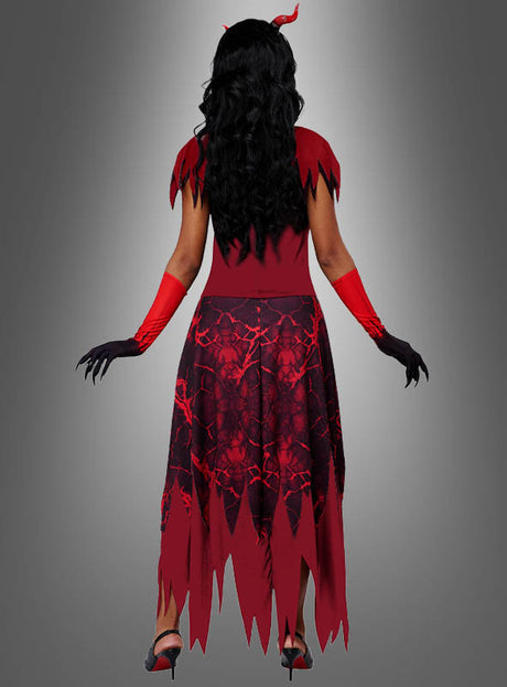 Eine Person, die das „Heißes Teufelin“-Kostüm für Damen trägt, steht mit dem Rücken zu einem grauen Hintergrund mit Farbverlauf. Dieses Halloween-Kostüm besticht durch einen gezackten Saum, rote Handschuhe, schwarze Handschuhe mit Krallen und Teufelshörner, die für einen auffälligen Look sorgen.