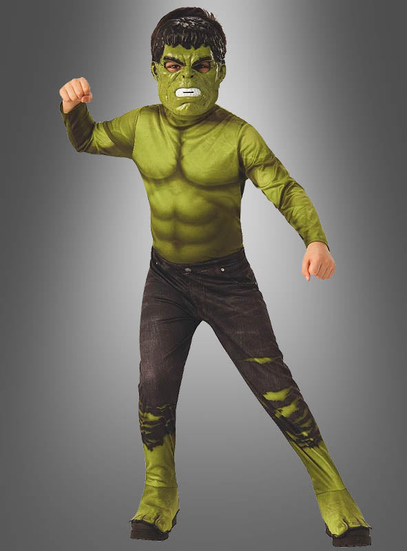 Ein Kind im Hulk-„Endgame“-Kostüm für Kinder, bestehend aus einem grünen Superheldenanzug mit Maske, muskulöser Brust und zerrissenen Hosen, das vor einem grauen Hintergrund eine kraftvolle Pose einnimmt – ideal für junge Fans, die einen authentischen Marvel-Avengers-Look suchen.