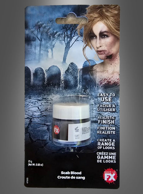 Eine Packung „Wundschorf Kunstblut Paste Make-up“, auch als „Scab Blood Make-up“ bekannt, wird in einem kleinen Tiegel geliefert und zeigt das Bild einer Frau mit Halloween-Zombie-Make-up in einer Friedhofsszene – ideal für deinen nächsten Halloween-Schminke-Look.