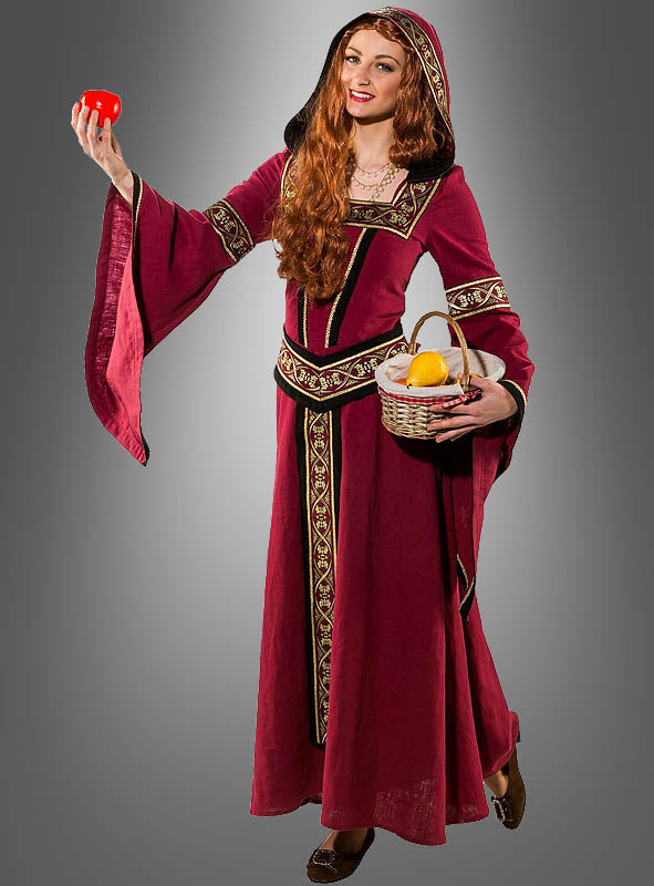 Eine Frau, die das „Mittelalter-Kleid Morgana mit Kapuze“ in Rot trägt, hält in der einen Hand einen roten Apfel und in der anderen einen Korb mit einer gelben Frucht und steht vor einem grauen Hintergrund mit Farbverlauf.