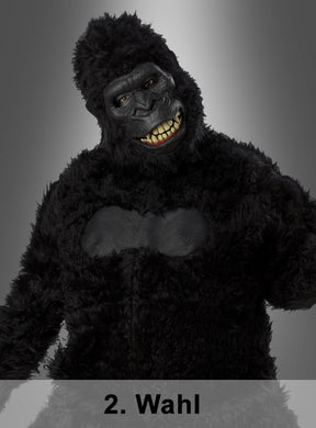 Eine Person, die das „2. Wahl Gorilla-Kostüm mit beweglicher Ani-Motion-Maske“ trägt, steht vor einem grauen Hintergrund mit Farbverlauf. Sie trägt das beeindruckende, dunkle, pelzige Tierkostüm für Herren, das sich ideal als Karnevalskostüm in Größe XL eignet. Der Text unten lautet „2. Wahl“.