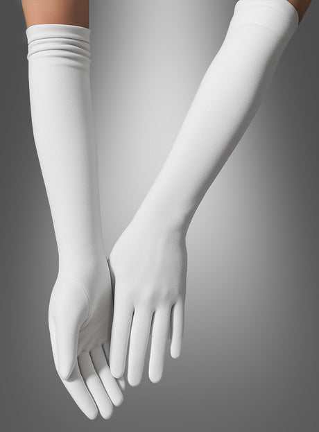 Zwei Hände, die „Lange Handschuhe 40 cm für Damen“ tragen – lange, eng anliegende weiße Handschuhe –, werden vor einem schlichten Hintergrund mit Farbverlauf gezeigt und erinnern an den zeitlosen Glamour eines Charleston-Kostüms aus den 20er Jahren.