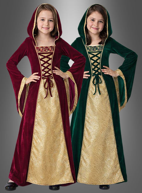Zwei Mädchen in mittelalterlichen Kapuzenkleidern – das eine in Rot und Gold, das andere in Grün und Gold – stehen Seite an Seite, die Hände in die Hüften gestemmt. Jedes „Mittelalter-Kleid Margret“ verkörpert auf wunderschöne Weise den Charme eines klassischen mittelalterlichen Kostüms und ist damit die perfekte Wahl für alle Damen, die auf der Suche nach zeitloser Eleganz sind.