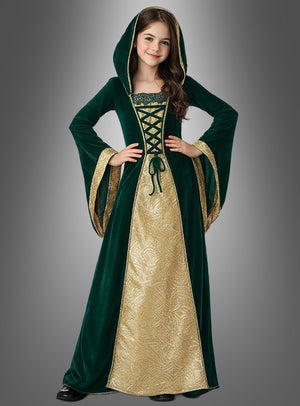 Ein Mädchen posiert in einem grün-goldenen mittelalterlichen Kleid namens „Margret“ – einem Kleid im mittelalterlichen Stil mit Kapuze, langen Glockenärmeln, Schnürung und schwarzen Schuhen – vor einem grauen Hintergrund. Dieses wunderschöne mittelalterliche Kostüm ist perfekt für Damen, die sich für historisch inspirierte Mode begeistern.