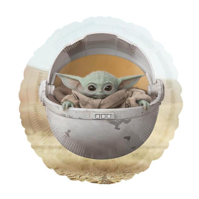 Ein Luftballon mit einer Abbildung von Grogu (Baby Yoda) in seinem schwebenden Kinderwagen vor einem hellen Wüstenhintergrund.