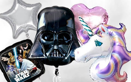 Fünf Folienballons: ein silberner Stern, ein rosa Herz, ein Einhorn, ein Darth-Vader-Helm und ein „Star Wars“-Ballon mit Filmfiguren und Logo, alle zusammen vor einem weißen Hintergrund.